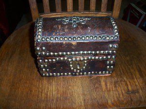 CIRCA 1850 TACKED TRUNK.