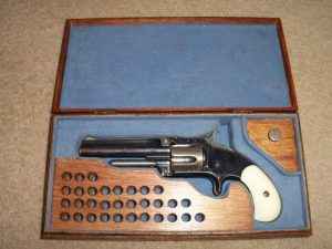 CASED SMITH & WESSON REVOLVER.