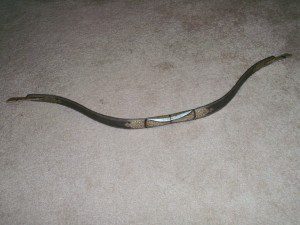 VINTAGE SILVER INLAID BOW.