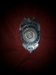 VINTAGE DEPUTY SHERIFF RAY COUNTY MO BADGE.